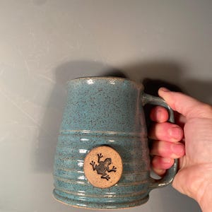 Frog Coffee Mug: Aqua Turquoise Pottery Mug with Stamped Medallion