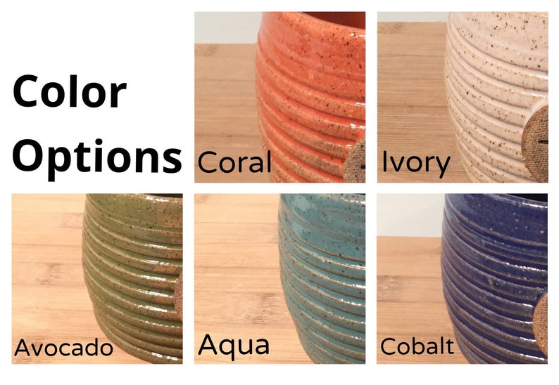 May include: Color options for a ceramic planter: coral, ivory, avocado, aqua, and cobalt. Each planter has a ribbed design and a speckled glaze.