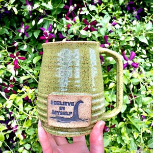 Loch Ness Monster Coffee Mug – I Believe in Myself Cryptid Stoneware (16 oz)