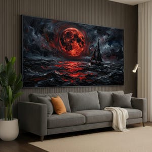 May include: A large rectangular wall art piece featuring an oil painting of a sailboat navigating dark, turbulent ocean waves under a massive, glowing red moon. The thick, textured brushstrokes create a dramatic scene with deep shadows and light.