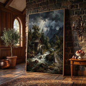 May include: A vertical rectangular wall art print featuring a landscape painting of a rustic wooden water mill situated beside a rushing stream, surrounded by dense forest and jagged mountains under a dramatic, cloudy sky with light rays.
