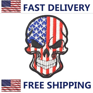 May include: Embroidered patch featuring a skull design with the American flag. The skull has red and white stripes on one side and blue stars on the other. The patch is outlined in black and has a white background.