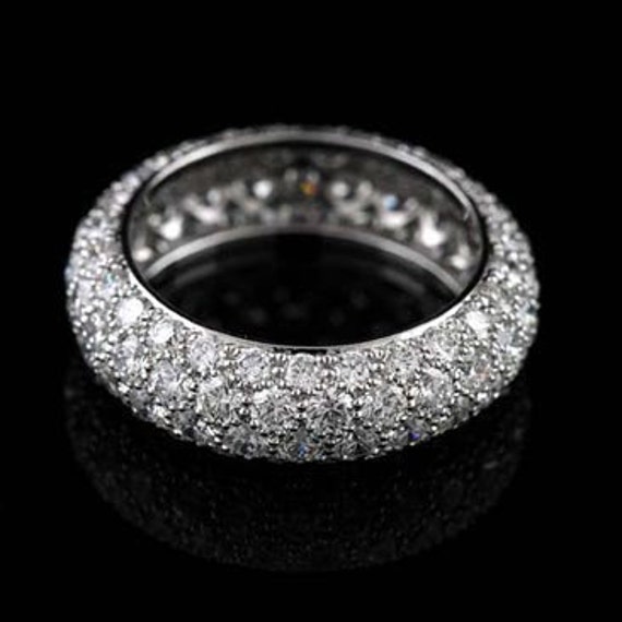 Platinum women's wedding shop band with diamonds