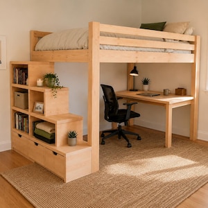 May include: A light-colored wooden loft bed featuring a built-in staircase with integrated shelving and storage drawers. Underneath the elevated bed frame is a desk workspace with a black office chair and a small desk lamp.