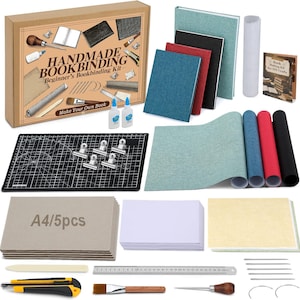 May include: A comprehensive handmade bookbinding kit for beginners, featuring a cardboard box labeled "HANDMADE BOOKBINDING," various colored fabric-covered book boards, paper sheets, a black cutting mat, metal clips, glue, a ruler, and tools.