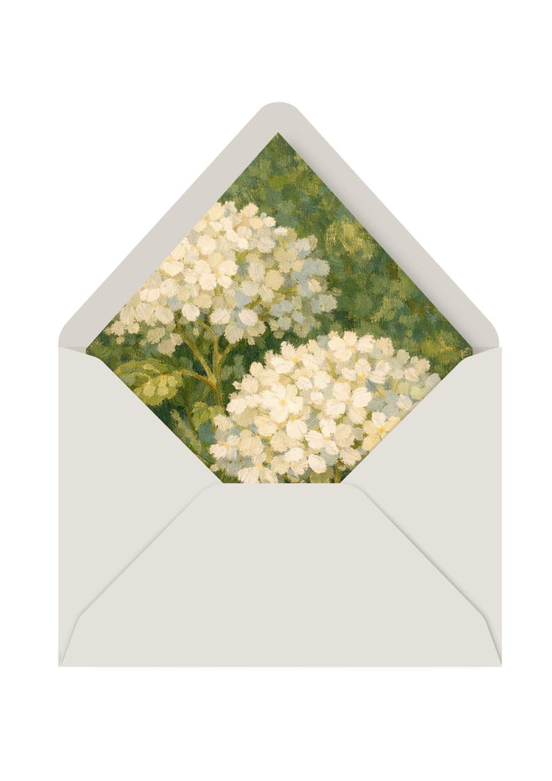 May include: A white envelope with a floral design on the inside. The artwork features a close-up of white hydrangea flowers against a green background. The envelope is open, revealing the artwork.