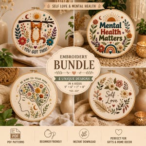 Puede incluir: Un conjunto de bordado con cuatro diseños únicos, que incluyen citas inspiradoras y elementos florales. Los tamaños disponibles son 12.7cm, 15.2cm, 17.8cm y 20.3cm. Los diseños incluyen un gato, un arcoíris y la frase "Self Love".