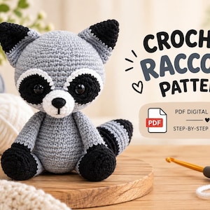 May include: A crocheted raccoon toy with grey and black yarn, featuring black eye patches, white muzzle, and a striped tail. Text reads CROCHET RACCOON PATTERN, PDF DIGITAL DOWNLOAD, and STEP-BY-STEP INSTRUCTIONS. A crochet hook rests on the wooden surface.