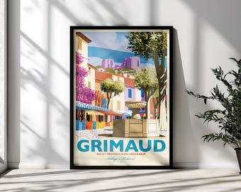 May include: A framed travel poster featuring a colorful illustration of a stone fountain in a town square, with buildings, trees, and purple flowers. The text reads GRIMAUD VAR 83 PROVENCE-ALPES-CÔTE D'AZUR Village Médiéval in blue and red lettering.
