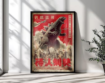 May include: A framed poster featuring a large, dark, textured monster roaring over a city skyline. The background is a vibrant red with white smoke and flying aircraft. Large red Japanese characters are printed at the bottom and top of the poster.