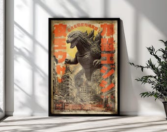 May include: A framed poster featuring a large, dark gray Godzilla creature towering over a ruined city landscape. The artwork includes bold, vertical red Japanese text on both sides and a yellow sun-like circle behind the monster's head.