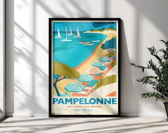 May include: A framed travel poster featuring a coastal scene of Pampelonne beach with turquoise water, sailboats, and rows of striped beach umbrellas on the sand. The text reads PAMPELONNE, VAR 83, PROVENCE-ALPES-CÔTE D'AZUR, Plage Mythique.