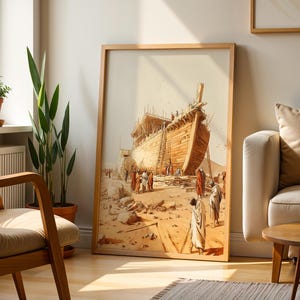 May include: A framed wall art print depicting a large wooden ship under construction in a desert landscape. The scene features figures in robes standing near the hull, with scaffolding and wooden beams visible against a light beige background.