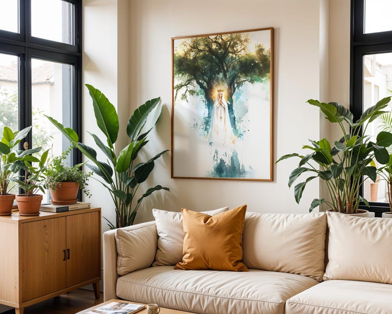 May include: A framed wall art print featuring a watercolour illustration of a figure in a white robe and crown standing before a large tree. The artwork uses shades of green, blue, and gold, displayed in a thin wooden frame on a white wall.