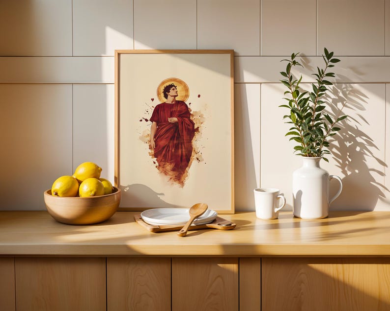 May include: A framed art print featuring a figure in a deep red robe with a golden halo, set against a cream background with abstract paint splatters. The artwork is displayed in a light wood frame, showcasing a classical aesthetic with a modern touch.
