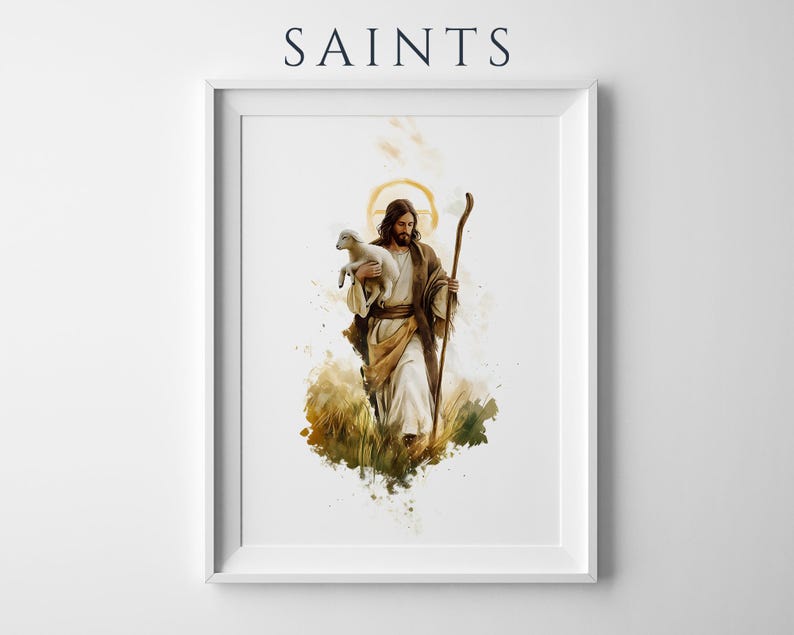 May include: A framed wall art print featuring the text SAINTS at the top. The illustration depicts a figure with long brown hair and a beard, wearing tan and white robes, holding a small white lamb and a wooden staff, with a golden halo.