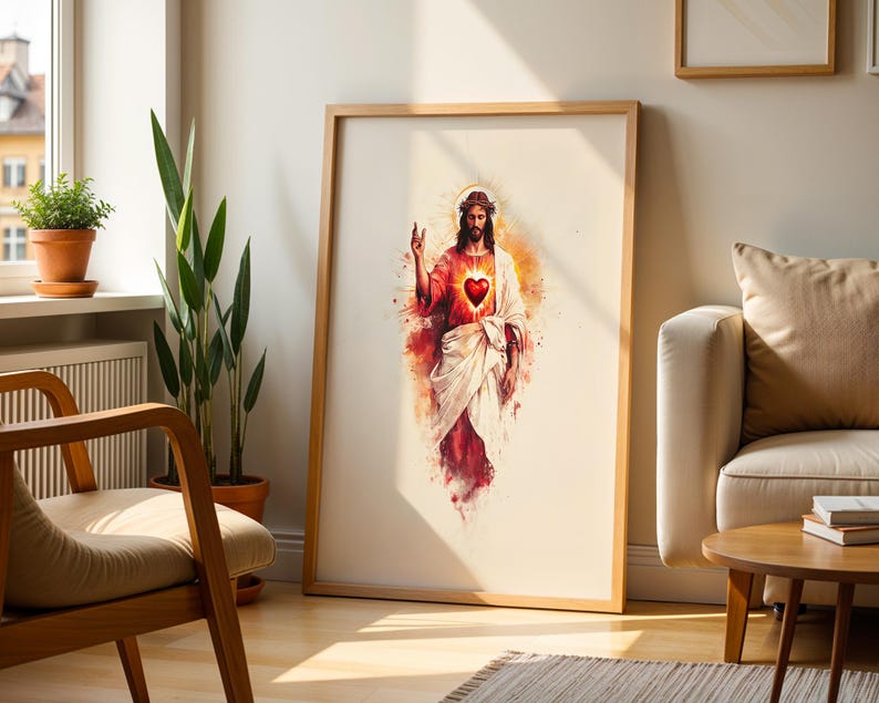 May include: A framed vertical wall art print featuring a watercolor-style illustration of a figure with long hair and a beard, wearing a white robe and red garment, with a glowing red heart on the chest and a golden halo around the head.
