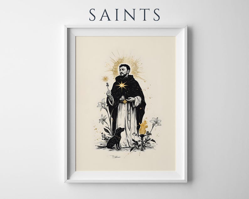 May include: A framed art print titled SAINTS featuring a black and white illustration of a robed figure with a gold star on their chest, a gold halo, a black dog, lilies, and a torch. The figure holds a small cross against a cream background.