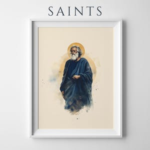 May include: A framed wall art print titled SAINTS featuring a watercolor-style illustration of a bearded figure with long hair wearing a dark blue robe. The figure is centered against a soft beige background with a circular golden halo behind the head.