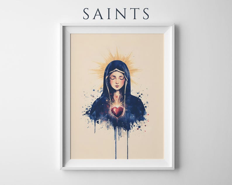 May include: A framed art print titled SAINTS featuring a watercolor-style illustration of a figure in a dark blue hooded cloak with eyes closed. A glowing red heart is centered on the chest with golden light rays radiating from behind the head.