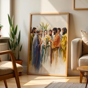 May include: A framed wall art print depicting a group of figures in robes surrounding a central figure holding a bouquet of yellow lilies. The artwork features a soft, watercolor-style aesthetic with muted tones of blue, orange, yellow, and white.