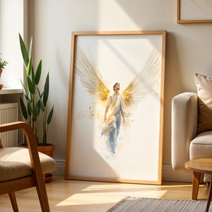 May include: A framed vertical wall art print featuring a watercolor-style illustration of a figure with large, expansive golden wings. The figure is depicted in a flowing white garment, looking upward with a sense of motion and light.