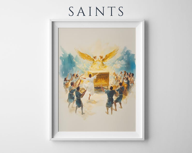 Puede incluir: Una impresi&oacute;n de arte mural enmarcada titulada SAINTS que presenta una ilustraci&oacute;n en acuarela de un grupo de personas con t&uacute;nicas azules rodeando un cofre dorado con una luz brillante y dos grandes figuras aladas doradas encima.
