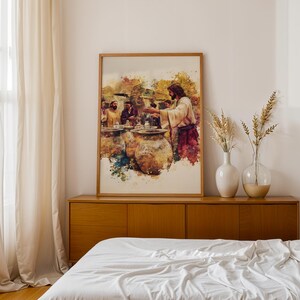 May include: A framed watercolor-style print depicting a biblical scene with a central figure in robes gesturing toward large clay vessels, surrounded by other individuals. The artwork features warm earth tones, golden yellows, and deep reds.