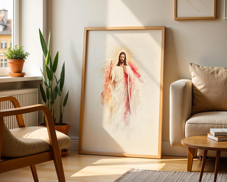 May include: A framed wall art print featuring a watercolor-style illustration of a figure with long brown hair and a beard, wearing white robes with red accents, depicted with a glowing golden halo and rays of light emanating from behind.