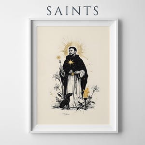 Op de afbeelding: Een ingelijste kunstdruk met het woord SAINTS bovenaan. De illustratie toont een figuur in een zwart-wit gewaad met een gouden ster op de borst, een aureool, een kleine hond, lelies en een fakkel, uitgevoerd in zwarte inkt met gouden accenten.