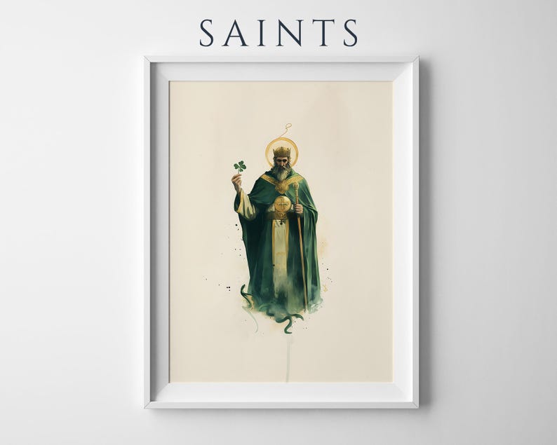 May include: A framed art print featuring the text SAINTS at the top. The illustration depicts a bearded figure in a dark green robe and crown, holding a green shamrock in one hand and a staff in the other, with a golden halo above the head.