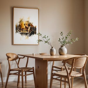 May include: A framed wall art print depicting a Last Supper scene in watercolour style with warm golden and brown tones. The artwork hangs above a light wood dining table featuring two ceramic vases with green branches and four wooden chairs.