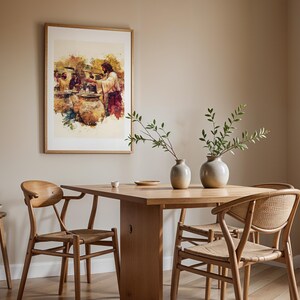 May include: A framed watercolor-style print depicting a biblical scene with figures and large clay jars hanging on a wall above a wooden dining table. The table features two ceramic vases with green branches, surrounded by four wooden chairs.