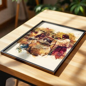 May include: A framed rectangular print featuring a watercolor-style illustration of a bearded figure in a light-colored robe standing at a table with others. The artwork uses warm tones of brown, red, and gold with visible paint splatters.