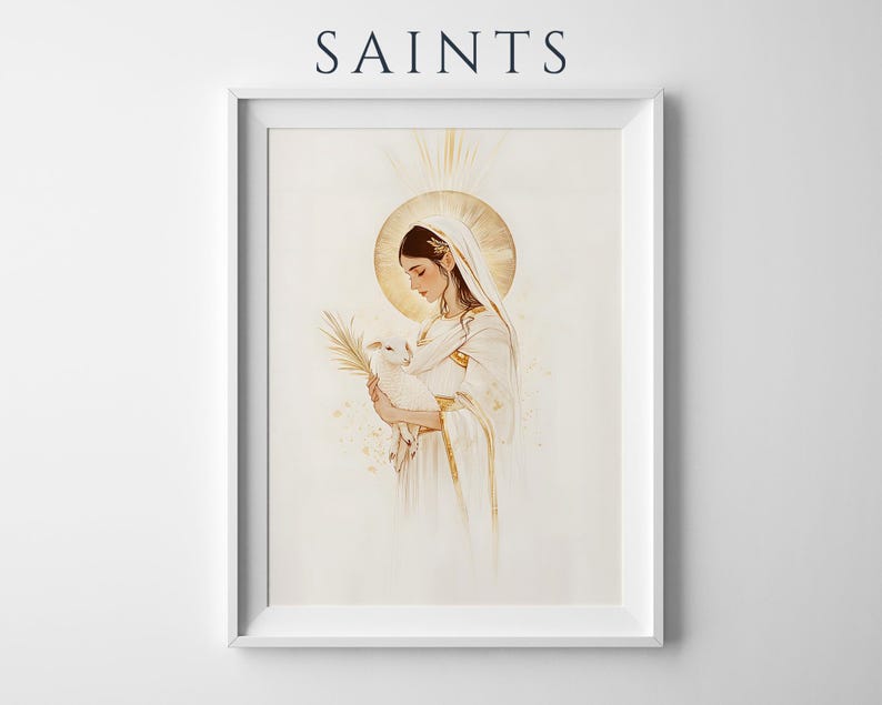 May include: A framed wall art print featuring the word SAINTS at the top. The illustration depicts a figure in white robes with a gold halo, holding a small white lamb and a palm frond, rendered in soft gold and cream tones on a light background.