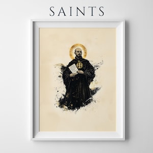 May include: A framed art print titled SAINTS featuring a bearded figure in a black robe with a gold halo and cross emblem. The figure holds a white document against a cream background with black ink splatters and artistic brushstroke effects.