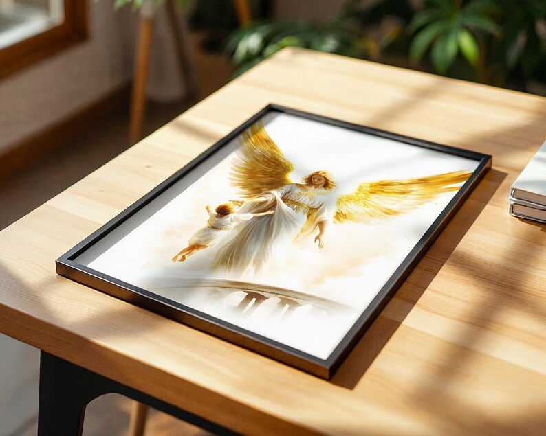 May include: A framed print featuring an illustration of a winged figure in a white robe with large golden wings, carrying a small child in white clothing above a bridge, set against a soft, light-colored background with golden highlights.