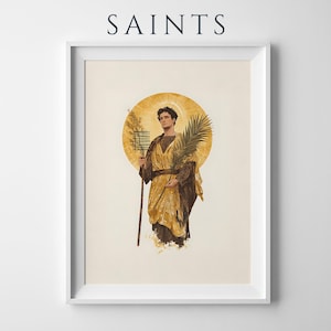Puede incluir: Una l&aacute;mina enmarcada titulada SAINTS que muestra una figura central con t&uacute;nicas doradas y un halo, sosteniendo una hoja de palma y un bast&oacute;n con forma de rejilla. La ilustraci&oacute;n utiliza una paleta de colores c&aacute;lidos en oro, marr&oacute;n y crema.