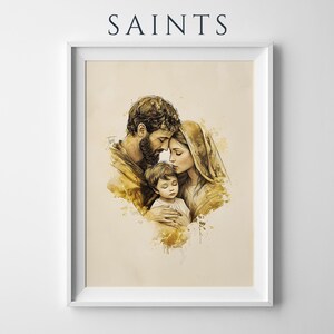 May include: A framed wall art print featuring the word SAINTS at the top. The illustration depicts a man, a woman, and a child in a warm, sepia-toned watercolor style. The figures are huddled together in a close embrace against a light background.