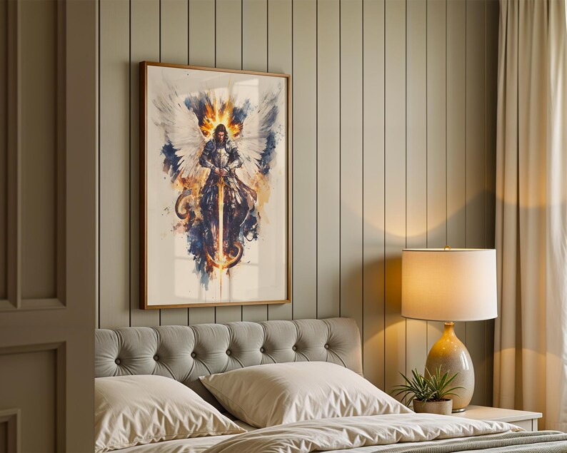May include: A framed wall art print featuring a watercolour-style illustration of a winged figure in armour holding a glowing sword. The artwork displays a vibrant colour palette of deep blues, bright oranges, and whites, set against a light background.