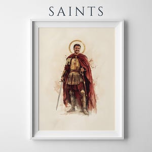 Puede incluir: Una l&aacute;mina art&iacute;stica enmarcada titulada SAINTS que presenta una ilustraci&oacute;n en acuarela de una figura con armadura met&aacute;lica y una capa roja fluida. La figura tiene un halo dorado, sostiene una espada y se encuentra sobre un fondo claro.