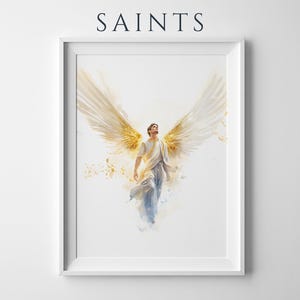 May include: A framed wall art print featuring the word SAINTS at the top. The artwork depicts a figure with large, expansive golden wings, wearing white and light blue flowing robes, rendered in a watercolor style against a white background.