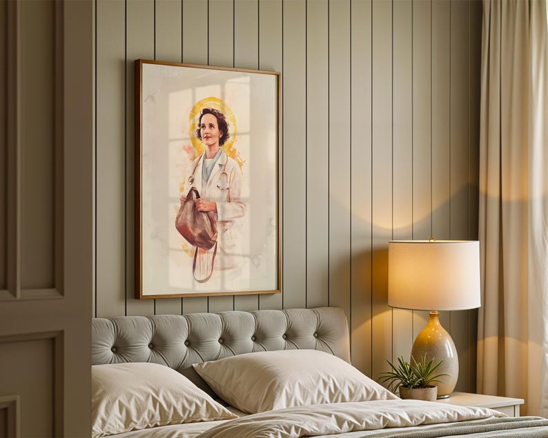 May include: A framed wall art print featuring a watercolor-style illustration of a medical professional in a white coat with a stethoscope around their neck, holding a brown bag, set against a soft yellow halo background in a vertical orientation.