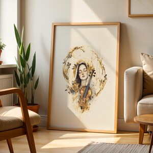 K&ouml;nnte beinhalten: Ein gerahmter Kunstdruck mit einer Aquarellillustration einer Person mit geschlossenen Augen, die eine Geige h&auml;lt, umgeben von goldenen Blumenakzenten und abstrakten kreisf&ouml;rmigen Pinselstrichen in Gold-, Braun- und Cremet&ouml;nen.