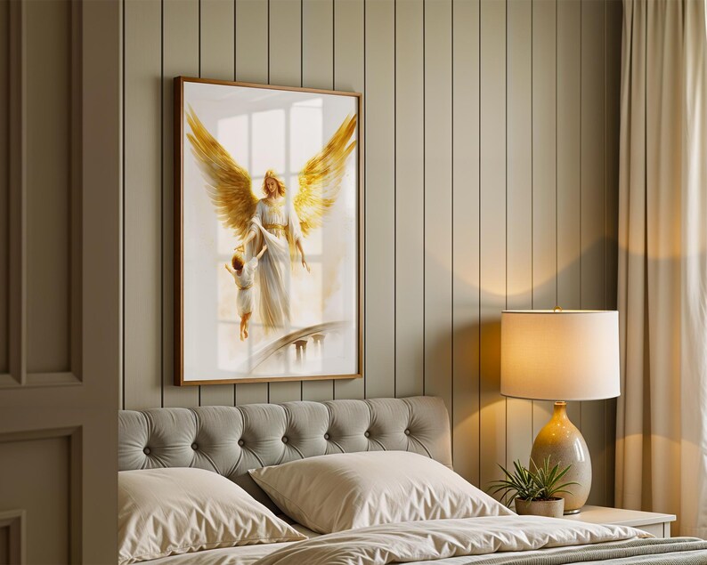 May include: A framed wall art print featuring a golden-winged angel in a white robe holding the hand of a small child. The artwork is displayed in a wooden frame on a vertical paneled wall above a tufted headboard and a bedside lamp.