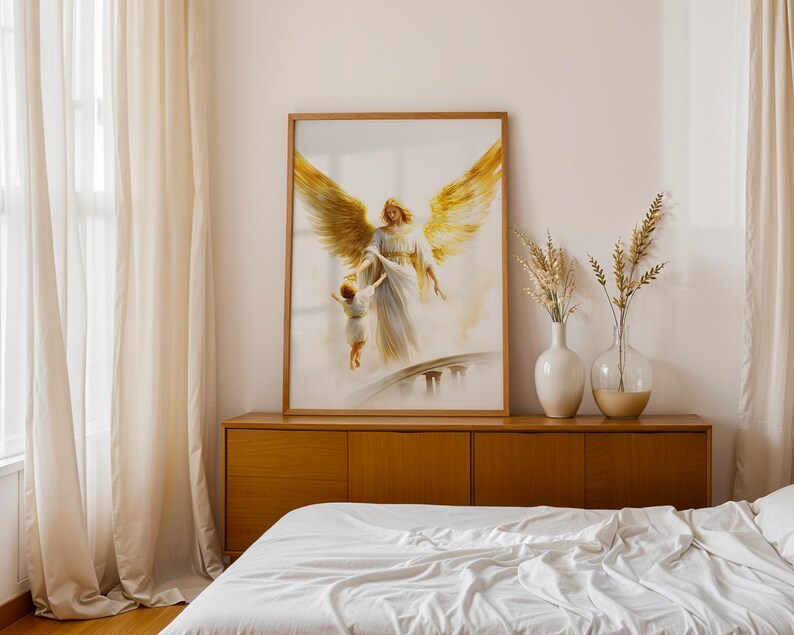 May include: A framed wall art print featuring a painting of a large angel with expansive golden wings reaching down to hold the hand of a small child. The angel wears a flowing white robe, and the scene is set against a soft, light background.