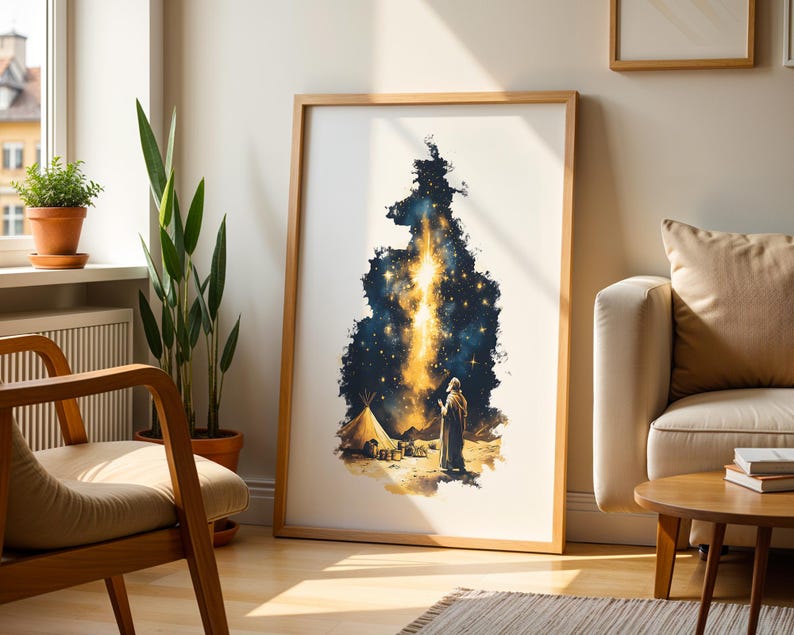 May include: A framed vertical wall art print featuring a dark blue and gold celestial scene. The illustration depicts a figure standing in a desert landscape near a tent, looking up at a bright, glowing vertical beam of light amidst starry skies.