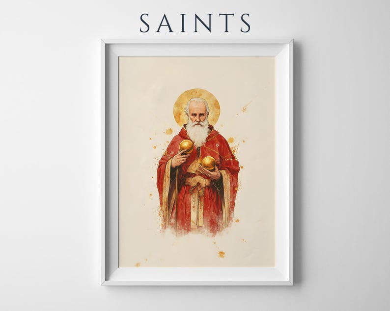 May include: A framed wall art print titled SAINTS featuring a watercolor-style illustration of a bearded figure in a red robe with gold trim. The figure has a gold halo and holds two golden spheres against a light cream background with splatters.
