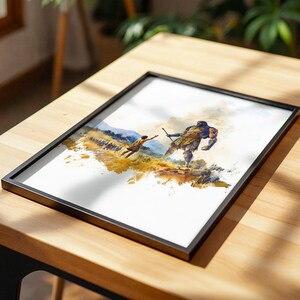 May include: A framed art print featuring a watercolour-style illustration of a small figure reaching towards a large, muscular, armoured giant in a golden-hued landscape. The artwork is enclosed in a thin black frame, showcasing a dynamic scene with expressive brushstrokes and a warm colour palette of yellows, browns, and blues.