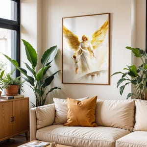 May include: A framed wall art print featuring a golden-winged angel in a white robe holding the hand of a small child. The angel has large, detailed yellow and gold wings, and the scene is depicted in a soft, ethereal style with light tones.